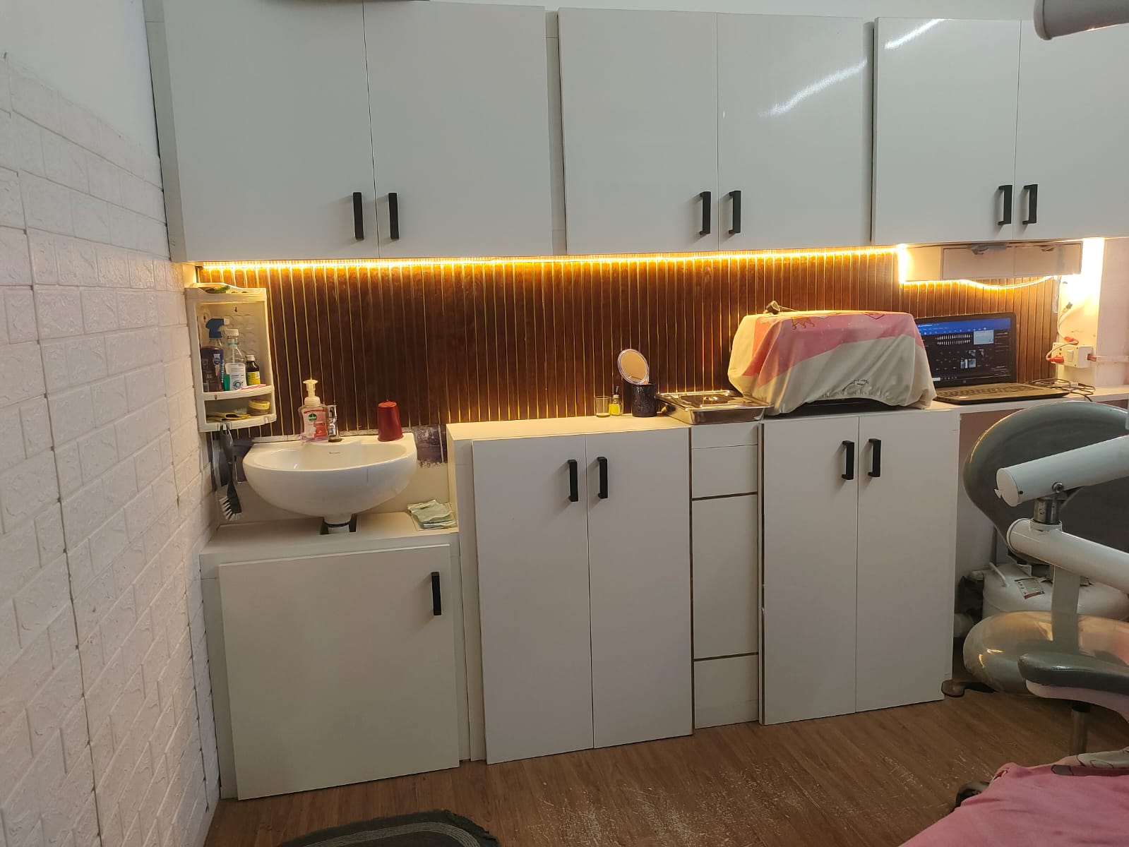 Clinic interior with modern cabinetry and equipment